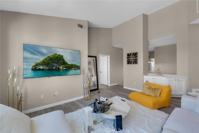 27055 Big Horn Mountain Way, Yorba Linda, CA 92887 - living area featuring wood finished floors, baseboards, and high vaulted ceiling