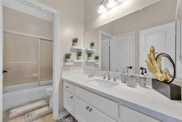 27055 Big Horn Mountain Way, Yorba Linda, CA 92887 - bathroom featuring vanity, toilet, combined bath / shower with glass door, and tile patterned floors