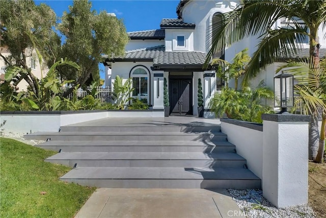 27055 Big Horn Mountain Way, Yorba Linda, CA 92887 - entrance to property featuring a tiled roof and stucco siding