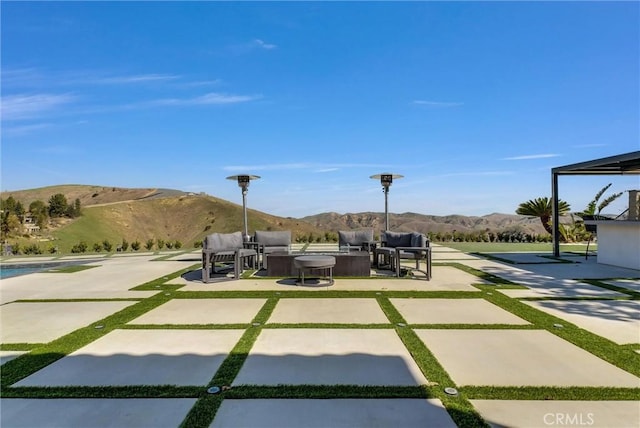 27055 Big Horn Mountain Way, Yorba Linda, CA 92887 - view of patio / terrace with outdoor lounge area and a mountain view
