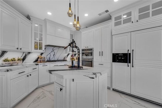 27055 Big Horn Mountain Way, Yorba Linda, CA 92887 - kitchen featuring light marble finish flooring, paneled built in refrigerator, stainless steel double oven, recessed lighting, and white cabinetry