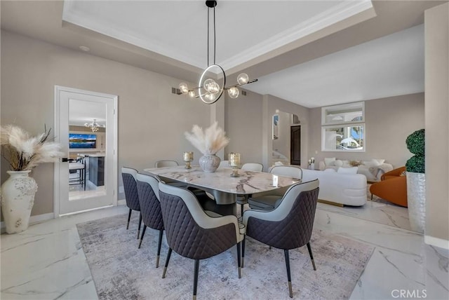 27055 Big Horn Mountain Way, Yorba Linda, CA 92887 - dining room featuring a chandelier, marble finish flooring, a tray ceiling, and ornamental molding