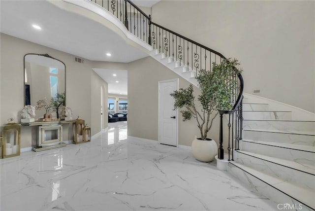 27055 Big Horn Mountain Way, Yorba Linda, CA 92887 - stairs featuring marble tiled flooring, recessed lighting, and a high ceiling