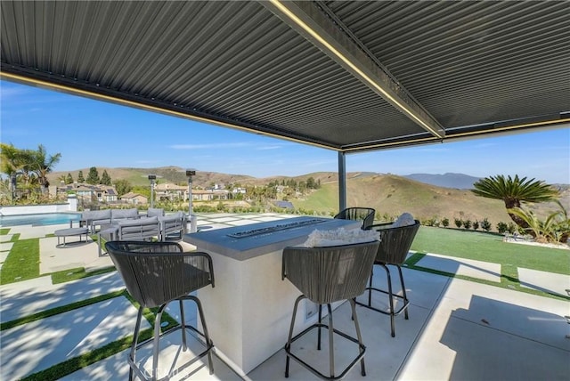 27055 Big Horn Mountain Way, Yorba Linda, CA 92887 - view of patio / terrace featuring a mountain view and an outdoor pool