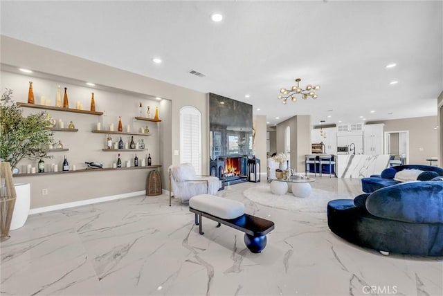 27055 Big Horn Mountain Way, Yorba Linda, CA 92887 - living room with marble tiled floors, recessed lighting, and a chandelier