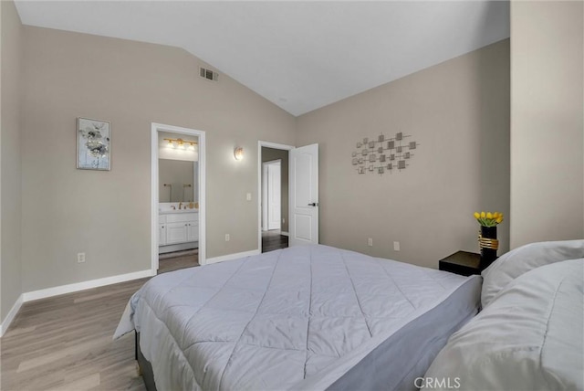 27055 Big Horn Mountain Way, Yorba Linda, CA 92887 - bedroom with wood finished floors, lofted ceiling, baseboards, and connected bathroom