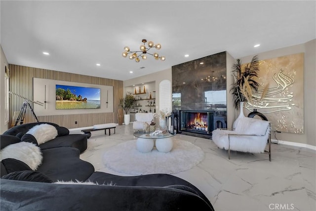 27055 Big Horn Mountain Way, Yorba Linda, CA 92887 - living area featuring marble tiled floors, a chandelier, a large fireplace, recessed lighting, and baseboards