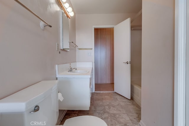 1947 Palacios Dr, San Pedro, CA 90732 - bathroom with toilet, vanity, washtub / shower combination, and baseboards