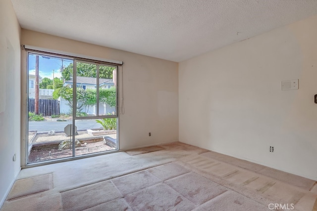 1947 Palacios Dr, San Pedro, CA 90732 - carpeted spare room featuring a textured ceiling