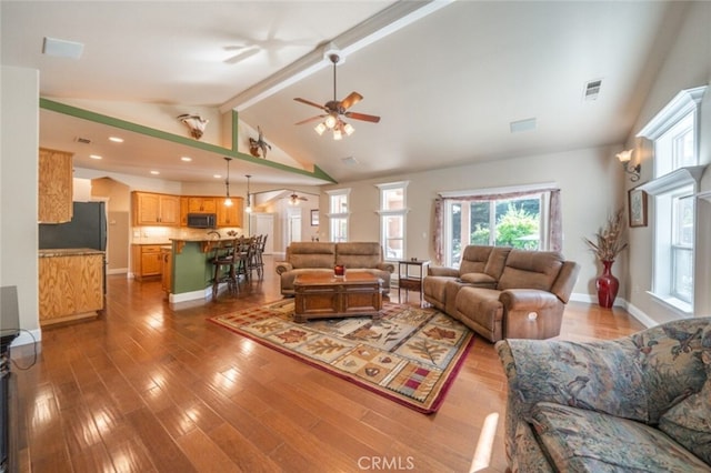 living room with a ceiling fan, wood finished floors, and recessed lighting