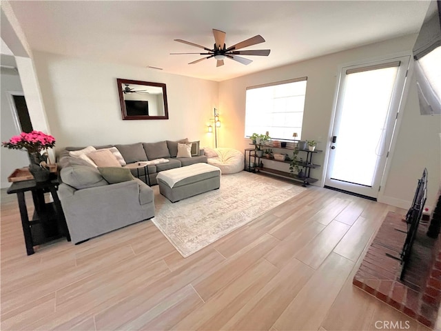 45723 Pheasant Pl, Temecula, CA 92592 - living room featuring light wood-style floors and ceiling fan