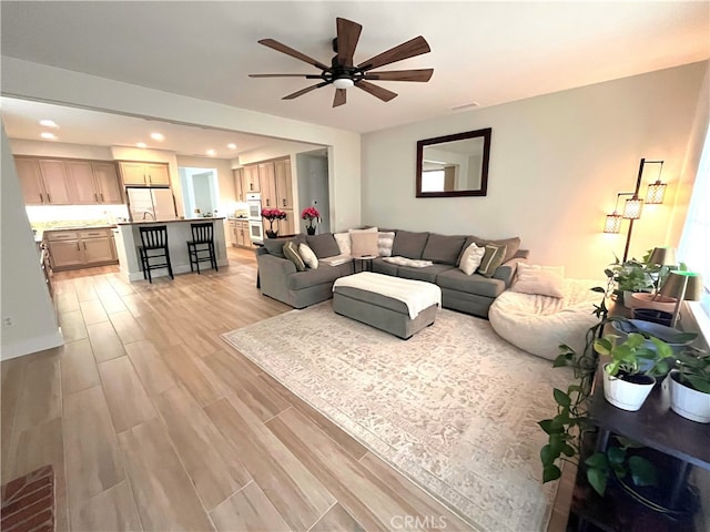 45723 Pheasant Pl, Temecula, CA 92592 - living room featuring light wood-style floors, recessed lighting, and ceiling fan