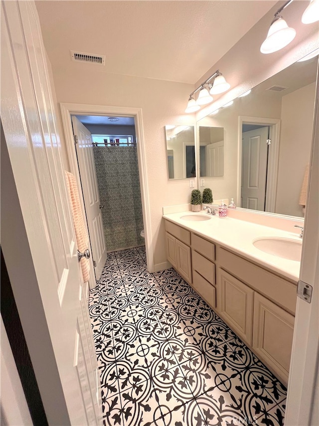 45723 Pheasant Pl, Temecula, CA 92592 - bathroom with double vanity and tile patterned flooring
