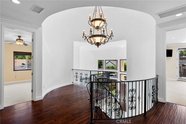 4818 Lemona Ave, Sherman Oaks, CA 91403 - hall with wood-type flooring, an upstairs landing, baseboards, recessed lighting, and crown molding