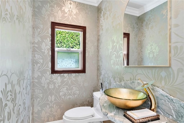 4818 Lemona Ave, Sherman Oaks, CA 91403 - bathroom featuring wallpapered walls, ornamental molding, a sink, and toilet