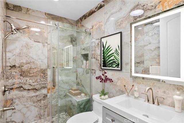4818 Lemona Ave, Sherman Oaks, CA 91403 - bathroom with tile walls, a stall shower, vanity, toilet, and backsplash