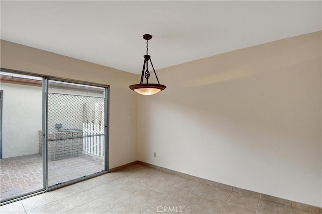 11000 Woodruff Ave Unit 14, Downey, CA 90241 - unfurnished room featuring light tile patterned floors and baseboards