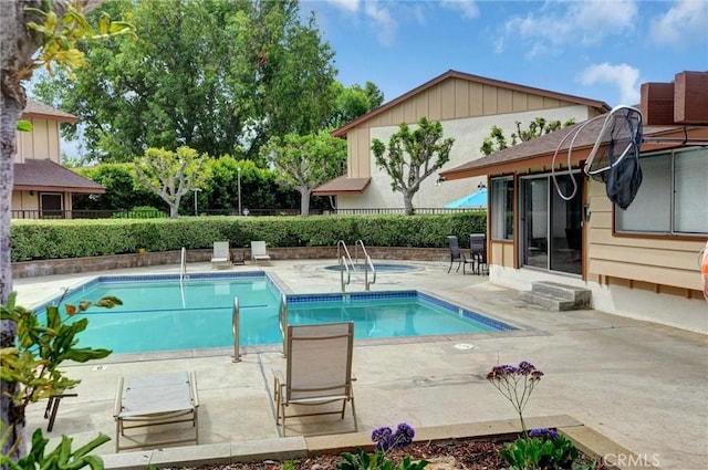 11000 Woodruff Ave Unit 14, Downey, CA 90241 - community pool with a patio, a fenced backyard, and entry steps