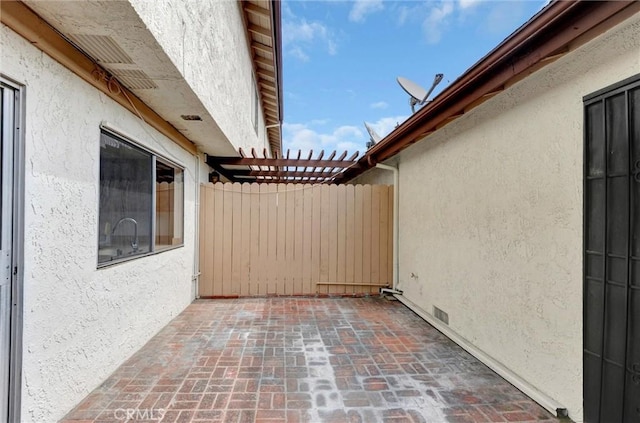 11000 Woodruff Ave Unit 14, Downey, CA 90241 - view of patio / terrace with fence