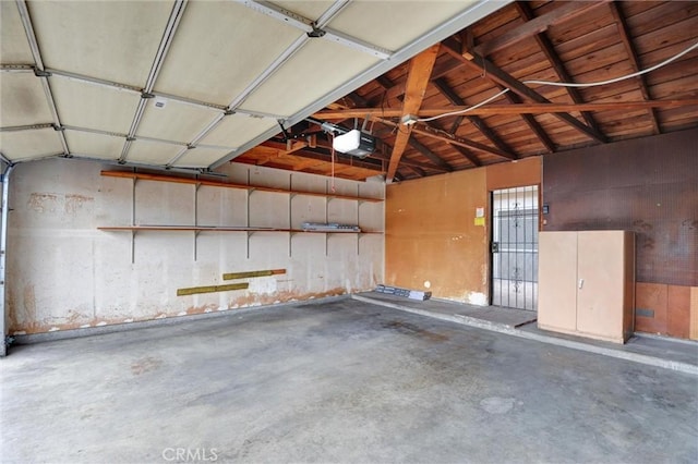 11000 Woodruff Ave Unit 14, Downey, CA 90241 - garage featuring a garage door opener
