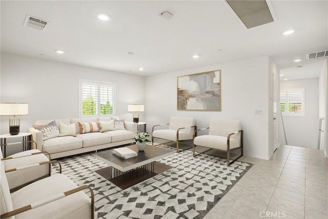 1004 Violet Ct, Calimesa, CA 92320 - tiled living area with plenty of natural light and recessed lighting