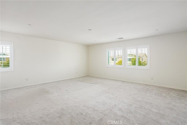 1004 Violet Ct, Calimesa, CA 92320 - spare room with light carpet and baseboards