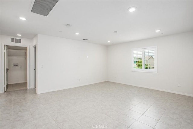 1004 Violet Ct, Calimesa, CA 92320 - empty room with recessed lighting, baseboards, and light tile patterned flooring