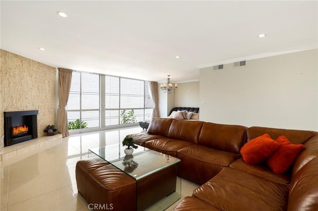 321 N Oakhurst Dr Unit 404, Beverly Hills, CA 90210 - living area with a chandelier, light tile patterned floors, a fireplace, crown molding, and recessed lighting