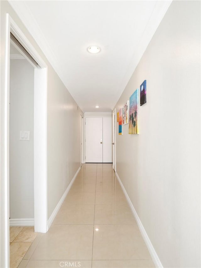 321 N Oakhurst Dr Unit 404, Beverly Hills, CA 90210 - corridor with baseboards, light tile patterned floors, and recessed lighting