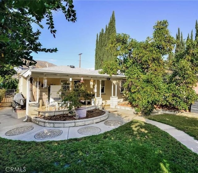 7918 Kyle St, Sunland, CA 91040 - view of front of home with a front yard and a patio area