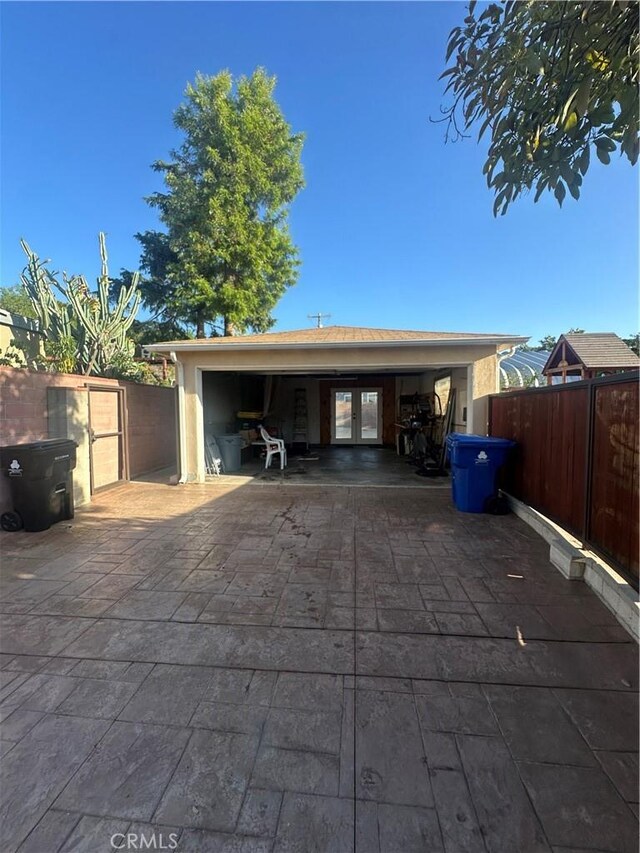 7918 Kyle St, Sunland, CA 91040 - garage with french doors and fence