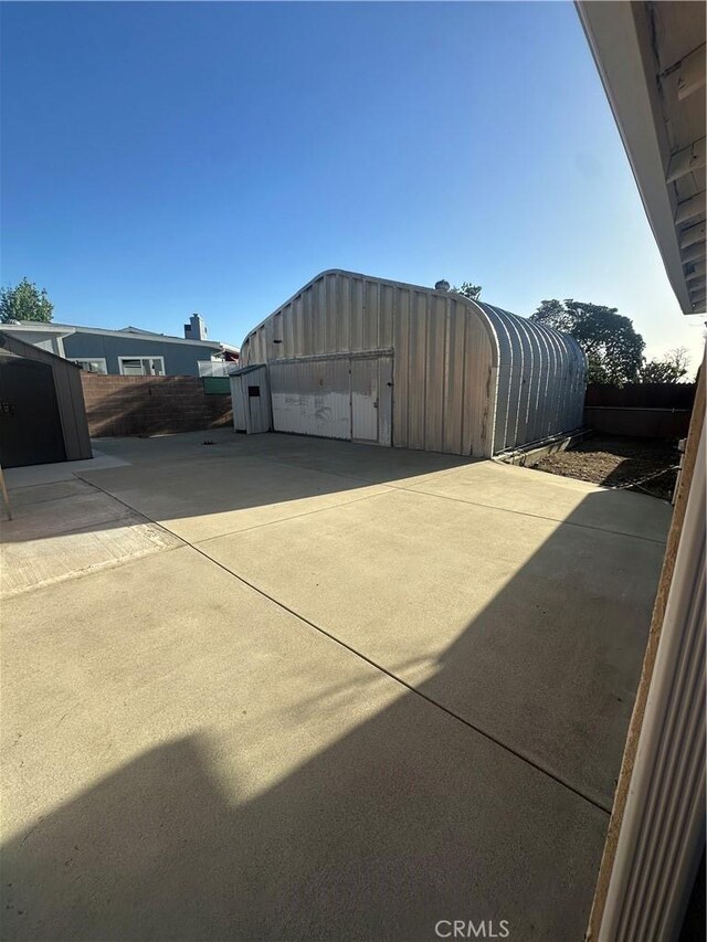 7918 Kyle St, Sunland, CA 91040 - view of patio featuring an outbuilding