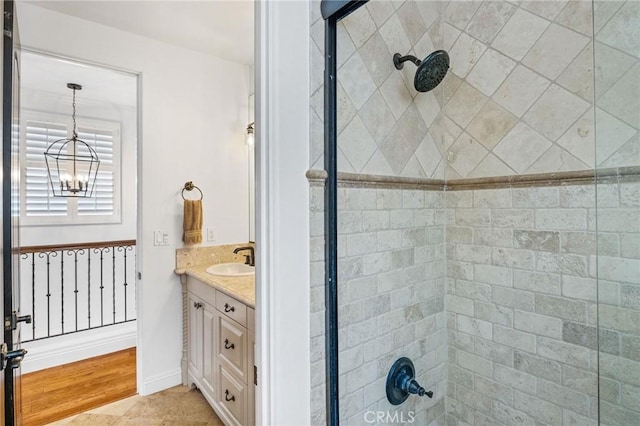 1715 Reed St, Redondo Beach, CA 90278 - full bathroom with a tile shower, vanity, and a chandelier