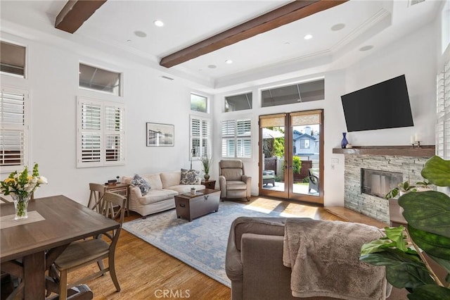 1715 Reed St, Redondo Beach, CA 90278 - living area featuring beam ceiling, light wood-style flooring, ornamental molding, recessed lighting, and a stone fireplace