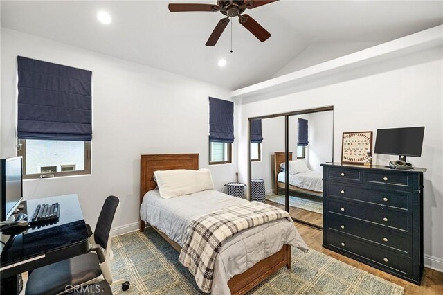 1715 Reed St, Redondo Beach, CA 90278 - bedroom featuring vaulted ceiling, a closet, wood finished floors, multiple windows, and ceiling fan