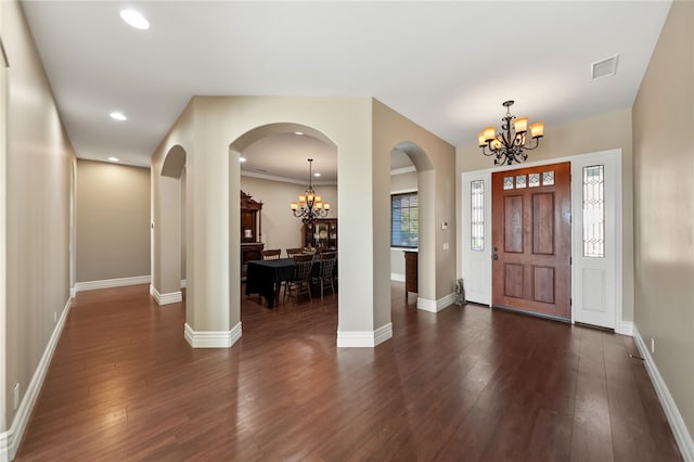 40267 Scanlon Rd, Temecula, CA 92592 - foyer entrance featuring a chandelier, arched walkways, dark wood-type flooring, baseboards, and recessed lighting