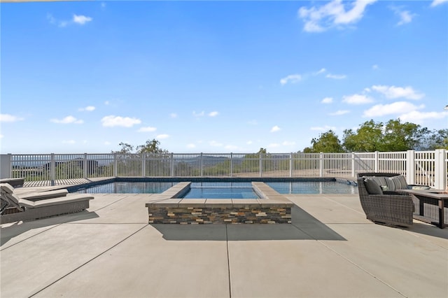 40267 Scanlon Rd, Temecula, CA 92592 - view of swimming pool featuring a fenced backyard, a patio, and a pool with connected hot tub