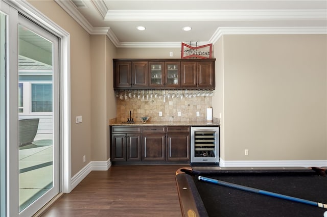40267 Scanlon Rd, Temecula, CA 92592 - indoor wet bar featuring beverage cooler, dark wood-style floors, recessed lighting, backsplash, and crown molding
