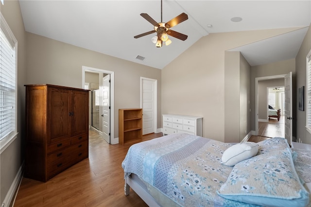 40267 Scanlon Rd, Temecula, CA 92592 - bedroom with lofted ceiling, wood finished floors, baseboards, and a ceiling fan