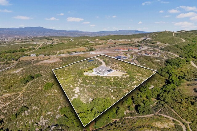 40267 Scanlon Rd, Temecula, CA 92592 - aerial overview of property's location featuring property boundaries highlighted and a mountain backdrop