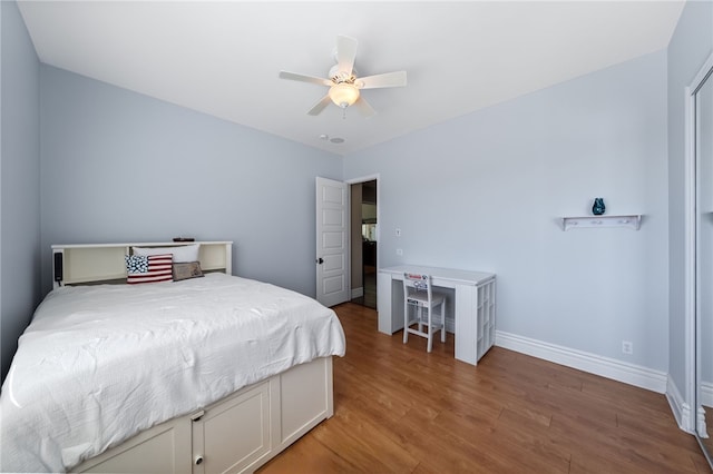 40267 Scanlon Rd, Temecula, CA 92592 - bedroom with baseboards, wood finished floors, and ceiling fan