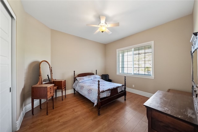 40267 Scanlon Rd, Temecula, CA 92592 - bedroom featuring baseboards, light wood finished floors, a ceiling fan, and a closet