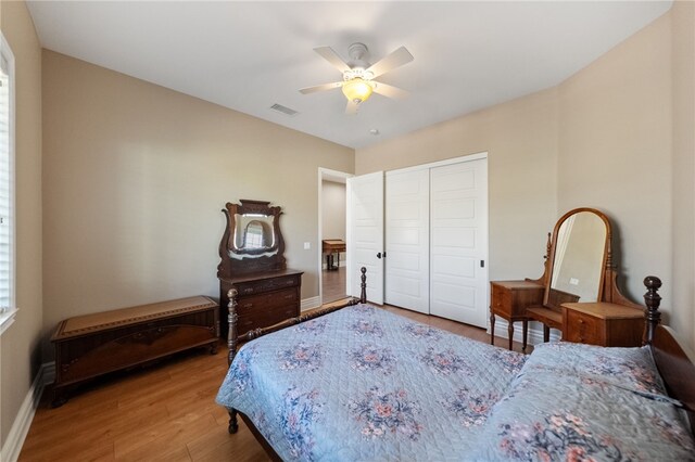 40267 Scanlon Rd, Temecula, CA 92592 - bedroom with wood finished floors, baseboards, a closet, and a ceiling fan