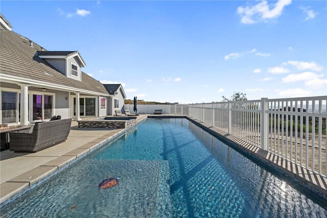 40267 Scanlon Rd, Temecula, CA 92592 - view of pool featuring an outdoor hangout area, a fenced backyard, a patio, and a pool with connected hot tub