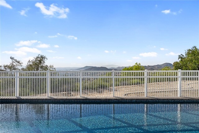 40267 Scanlon Rd, Temecula, CA 92592 - view of pool featuring fence and a mountain view