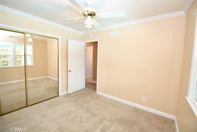 5309 Emerald St, Torrance, CA 90503 - unfurnished bedroom featuring light carpet, ornamental molding, a closet, baseboards, and a ceiling fan