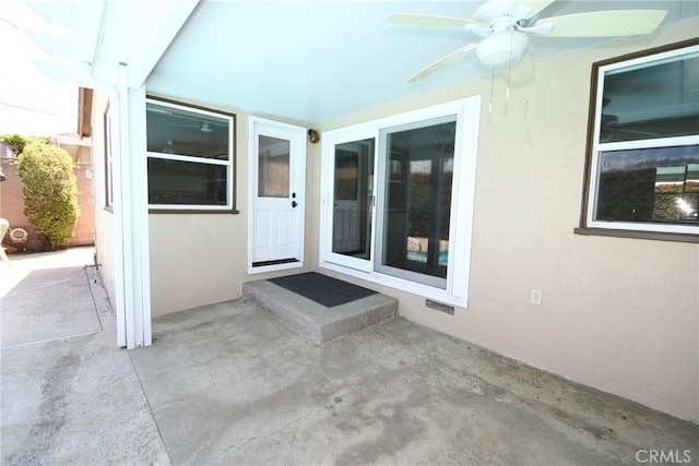 5309 Emerald St, Torrance, CA 90503 - view of exterior entry with ceiling fan, stucco siding, and a patio