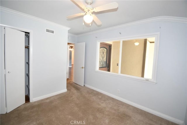 5309 Emerald St, Torrance, CA 90503 - unfurnished bedroom with carpet, baseboards, crown molding, a closet, and ceiling fan