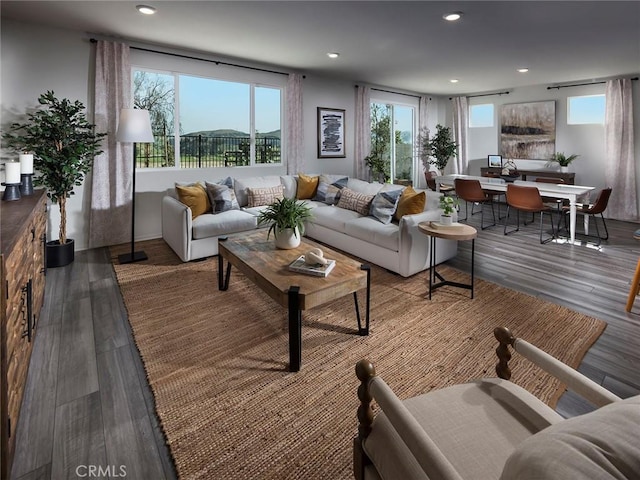 35232 Lopez Ln, Beaumont, CA 92223 - living area featuring healthy amount of natural light, wood finished floors, recessed lighting, and a desk
