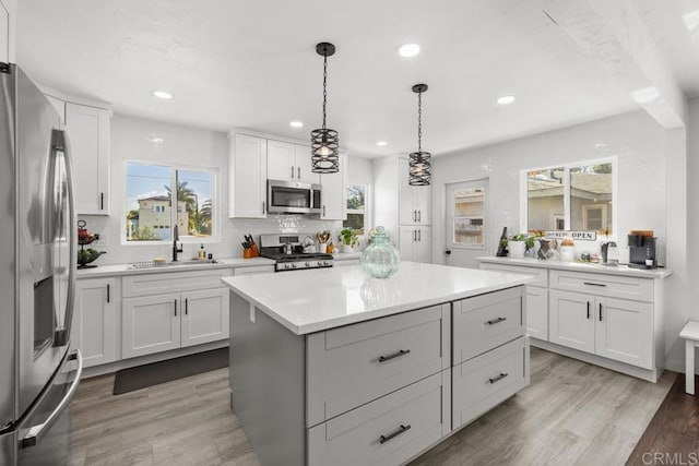 852 5th St, Imperial Beach, CA 91932 - kitchen with stainless steel appliances, a sink, healthy amount of natural light, light countertops, and recessed lighting